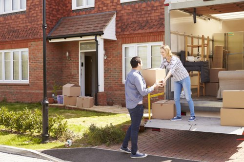 Residential move support in Ilford with boxes and furniture
