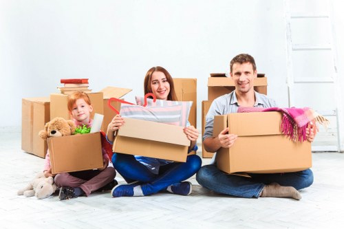 Packed office boxes and desks prepared for relocation