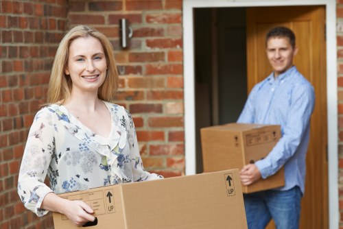 Removal van and boxes prepared for a flat move in Ilford