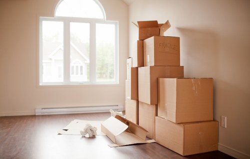 Loading furniture into a van for an Ilford move