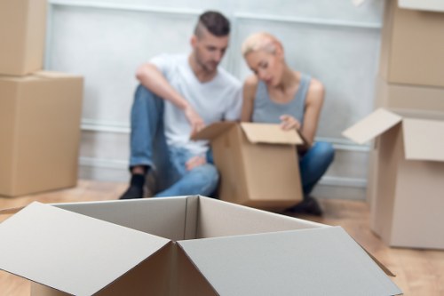 Furniture and boxes being moved by a local Ilford removals team