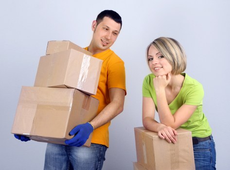 Loading furniture into a van for a move in Ilford
