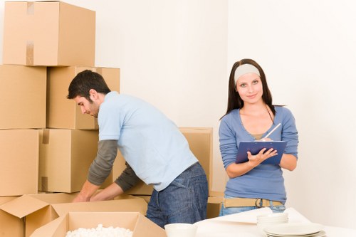 Office furniture and boxes prepared for a local business move