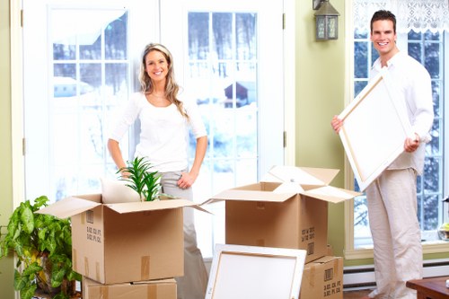 A removals team planning a quote for a family property in Ilford